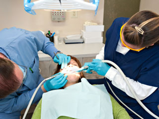 Photo of training for dental assistant career.
